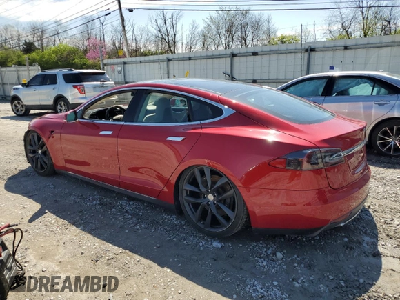 2014 Tesla Model S 60 with VIN 5YJSA1S12EFP65799, listed as a Copart auction lot 50895235 with 132,669 mi miles and Salvage Title. Bid and sale history available at DreamBid. Image 2.