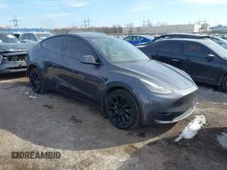 2022 Tesla Model Y Long Range z VIN 7SAYGDEE6NA013757, wystawiony jako IAAI lot #41364867 z przebiegiem 33 621 mil mil oraz . Historia ofert i sprzedaży dostępna na DreamBid. Obrazek 1.