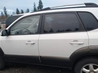 2005 Hyundai Tucson GLS with VIN KM8JN72D75U060416, listed as a IAAI auction lot 41212714 with 173,421 mi miles. Bid and sale history available at carsss.com. Image 14.