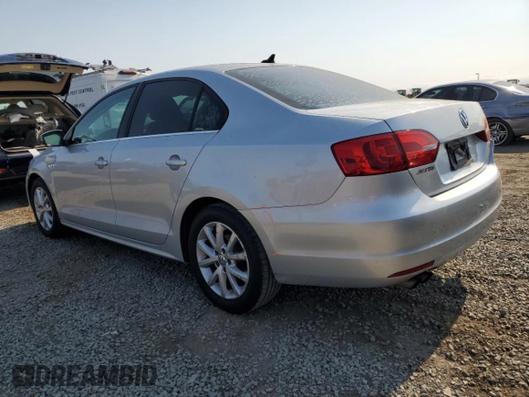 2014 Volkswagen Jetta SE с VIN 3VWD17AJ9EM437088, выставлен на аукционе Copart как лот 64810275 с пробегом 92 165 миль миль и Списание • Salvage title. История ставок и продаж доступна на DreamBid. Изображение 2.