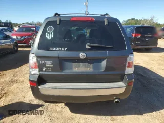 2009 Mercury Mariner Premier z VIN 4M2CU87729KJ12913, wystawiony jako Copart lot #81234994 z przebiegiem 194 091 mil mil oraz Szkoda całkowita • Salvage title. Historia ofert i sprzedaży dostępna na DreamBid. Obrazek 6.