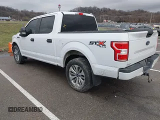 2018 Ford F-150 XL with VIN 1FTEW1E59JKD99284, listed as a IAAI auction lot 41203530 with 153,800 mi miles. Bid and sale history available at carsss.com. Image 3.