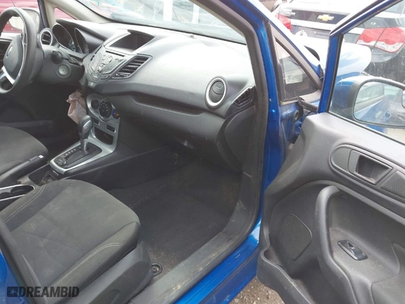 2018 Ford Fiesta SE with VIN 3FADP4BJ9JM106252, listed as a IAAI auction lot 41769188 with 94,088 mi miles. Bid and sale history available at carsss.com. Image 5.