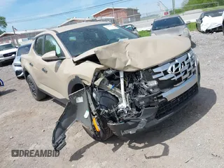 2023 Hyundai Santa Cruz SEL z VIN 5NTJB4AE3PH077055, wystawiony jako IAAI lot #42069791 z przebiegiem 84 585 mil mil oraz . Historia ofert i sprzedaży dostępna na DreamBid. Obrazek 1.