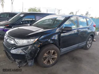 2019 Honda CR-V LX with VIN 2HKRW5H33KH406779, listed as a IAAI auction lot 41953202 with 73,039 mi miles. Bid and sale history available at carsss.com. Image 2.