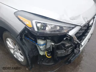 2021 Hyundai Tucson SE with VIN KM8J2CA40MU392425, listed as a IAAI auction lot 41706694 with 103,603 mi miles. Bid and sale history available at carsss.com. Image 6.