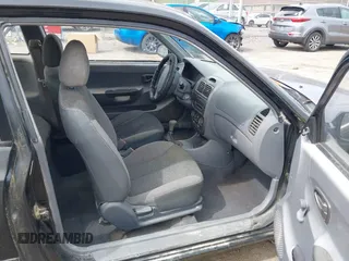 2000 Hyundai Accent z VIN KMHCF35G5YU017900, wystawiony jako IAAI lot #42063663 z przebiegiem 170 283 mil mil oraz . Historia ofert i sprzedaży dostępna na DreamBid. Obrazek 5.