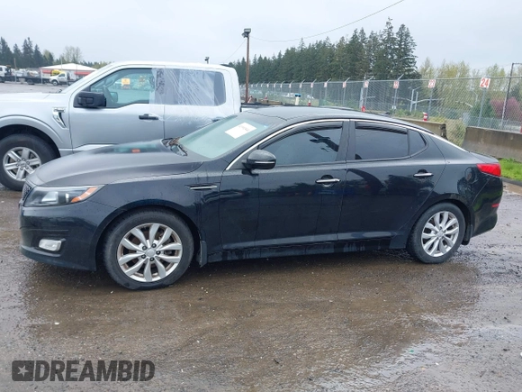 2015 Kia Optima EX with VIN 5XXGN4A71FG391444, listed as a IAAI auction lot 41991844 with 126,197 mi miles. Bid and sale history available at carsss.com. Image 14.