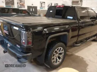 2017 GMC Sierra 1500 SLT z VIN 3GTU2NEC8HG512138, wystawiony jako Copart lot #58624055 z przebiegiem 120 000 mil mil oraz Czysty tytuł • Clean title. Historia ofert i sprzedaży dostępna na DreamBid. Obrazek 4.