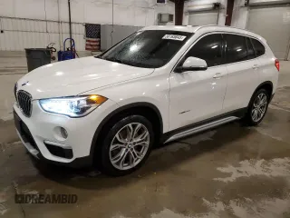 2018 BMW X1 xDrive28i with VIN WBXHT3C30J5K29917, listed as a Copart auction lot 56165845 with 131,876 mi miles and Salvage title. Bid and sale history available at DreamBid. Image 1.