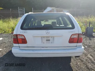1998 Mercedes-Benz E-Class with VIN WDBJH82FXWX013155, listed as a Copart auction lot 68515674 with 223,294 mi miles and Salvage Title. Bid and sale history available at carsss.com. Image 6.