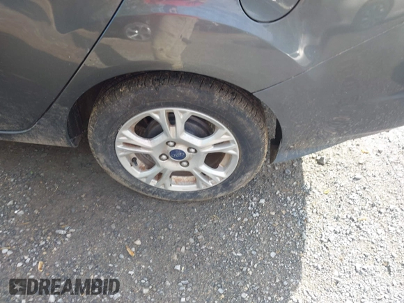2016 Ford Fiesta SE z VIN 3FADP4BJ8GM184675, wystawiony jako IAAI lot #42169234 z przebiegiem 54 231 mil mil oraz . Historia ofert i sprzedaży dostępna na DreamBid. Obrazek 12.