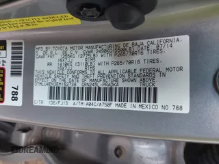 2014 Toyota Tacoma with VIN 3TMLU4EN3EM162738, listed as a IAAI auction lot 41871226 with 135,318 mi miles and . Bid and sale history available at DreamBid. Image 9.
