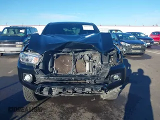 2021 Toyota Tacoma 4WD SR5 with VIN 3TMDZ5BN6MM111605, listed as a IAAI auction lot 41265774 with 68,043 mi miles. Bid and sale history available at carsss.com. Image 13.
