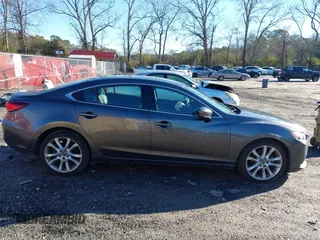 2017 Mazda 6 Touring with VIN JM1GL1V54H1130336, listed as a IAAI auction lot 41586397 with 114,076 mi miles and . Bid and sale history available at DreamBid. Image 13.