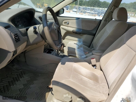 2002 Mazda Protege DX with VIN JM1BJ225X21597889, listed as a Copart auction lot 72237874 with 254,402 mi miles and Salvage Title. Bid and sale history available at carsss.com. Image 7.