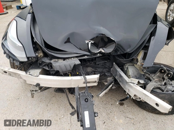 2022 Tesla Model 3 with VIN 5YJ3E1EA6NF188263, listed as a Copart auction lot 77542203 with 75,461 mi miles and Non Repairable. Bid and sale history available at DreamBid. Image 11.