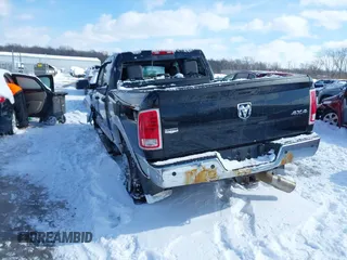 2015 Ram 2500 Laramie with VIN 3C6UR5FLXFG584408, listed as a IAAI auction lot 41588107 with 177,520 mi miles. Bid and sale history available at carsss.com. Image 3.