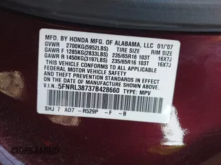 2007 Honda Odyssey EX-L z VIN 5FNRL38737B428660, wystawiony jako IAAI lot #42087846 z przebiegiem 176 479 mil mil oraz . Historia ofert i sprzedaży dostępna na DreamBid. Obrazek 9.