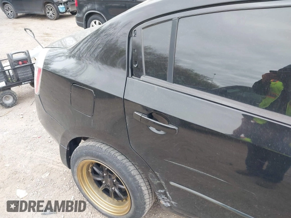 2008 Nissan Sentra S with VIN 3N1AB61E28L734653, listed as a IAAI auction lot 42026984 with 144,944 mi miles and . Bid and sale history available at DreamBid. Image 12.