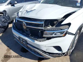 2021 Volkswagen Atlas SE z VIN 1V2JE2CA9MC200352, wystawiony jako IAAI lot #41367596 z przebiegiem 118 354 mil mil oraz . Historia ofert i sprzedaży dostępna na DreamBid. Obrazek 6.