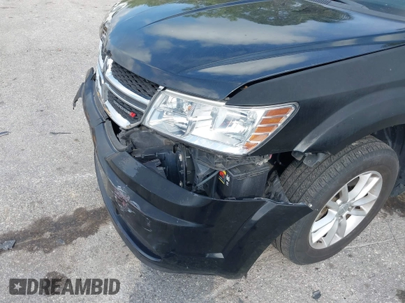 2013 Dodge Journey SE with VIN 3C4PDCAB0DT710609, listed as a IAAI auction lot 41763431 with 145,851 mi miles and . Bid and sale history available at DreamBid. Image 14.
