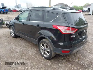 2014 Ford Escape SE with VIN 1FMCU9G9XEUD39077, listed as a IAAI auction lot 42205040 with 92,355 mi miles and . Bid and sale history available at DreamBid. Image 3.