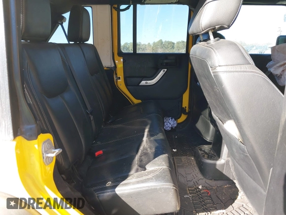 2015 Jeep Wrangler Unlimited Rubicon z VIN 1C4BJWFG4FL681946, wystawiony jako IAAI lot #40809597 z przebiegiem 57 148 mil mil oraz . Historia ofert i sprzedaży dostępna na DreamBid. Obrazek 8.