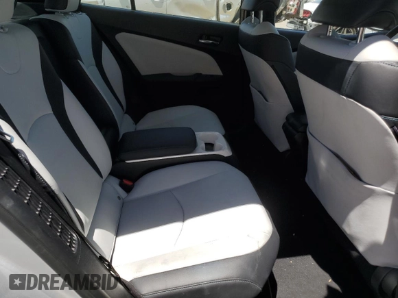 2017 Toyota Prius Plus z VIN JTDKARFP3H3017836, wystawiony jako Copart lot #57613355 z przebiegiem 64 958 mil mil oraz Szkoda całkowita • Salvage title. Historia ofert i sprzedaży dostępna na DreamBid. Obrazek 10.