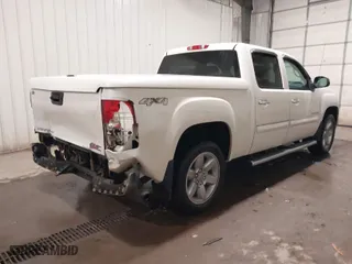 2013 GMC Sierra 1500 SLT with VIN 3GTP2WE76DG197565, listed as a IAAI auction lot 41344388 with 134,972 mi miles. Bid and sale history available at carsss.com. Image 4.
