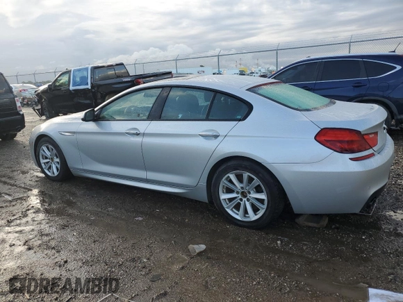 2016 BMW 6 Series 640i with VIN WBA6D0C53GD927810, listed as a Copart auction lot 63524364 with 53,118 mi miles and Salvage Title. Bid and sale history available at carsss.com. Image 2.