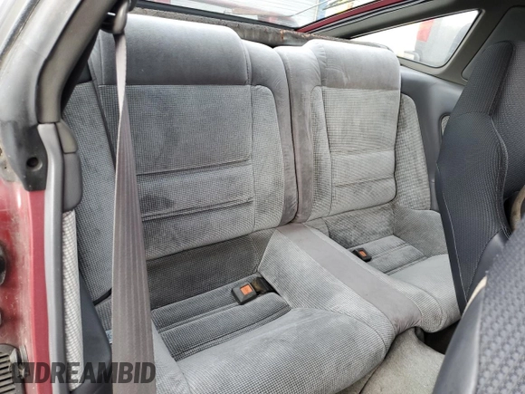 1987 Toyota Supra z VIN JT2MA71J4H0068594, wystawiony jako Copart lot #81918653 z przebiegiem 91 630 mil mil oraz Szkoda całkowita • Salvage title. Historia ofert i sprzedaży dostępna na DreamBid. Obrazek 10.