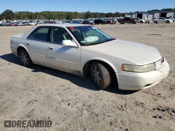 2003 Cadillac Seville Luxury SLS z VIN 1G6KS54Y13U261492, wystawiony jako Copart lot #80113764 z przebiegiem 184 880 mil mil oraz Szkoda całkowita • Salvage title. Historia ofert i sprzedaży dostępna na DreamBid. Obrazek 4.