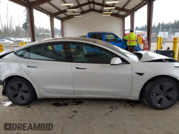 2023 Tesla Model 3 z VIN 5YJ3E1EA8PF412166, wystawiony jako IAAI lot #41461983 z przebiegiem 25 908 mil mil oraz . Historia ofert i sprzedaży dostępna na DreamBid. Obrazek 13.