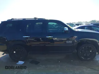 2011 Chevrolet Tahoe LT with VIN 1GNSCBE08BR183366, listed as a IAAI auction lot 42343281 with 211,674 mi miles and . Bid and sale history available at DreamBid. Image 13.