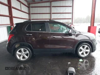 2015 Chevrolet Trax LTZ with VIN KL7CJTSB9FB147244, listed as a IAAI auction lot 41722081 with 125,675 mi miles. Bid and sale history available at carsss.com. Image 13.