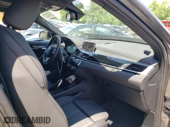 2021 BMW X2 xDrive28i with VIN WBXYJ1C02M5S79433, listed as a Copart auction lot 49393422 with 22,557 mi miles. Bid and sale history available at carsss.com. Image 5.