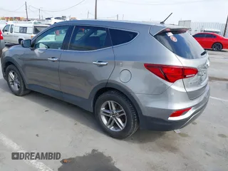 2018 Hyundai Santa Fe 2.4L with VIN 5NMZT3LB4JH069868, listed as a IAAI auction lot 42675555 with 142,612 mi miles and . Bid and sale history available at DreamBid. Image 3.