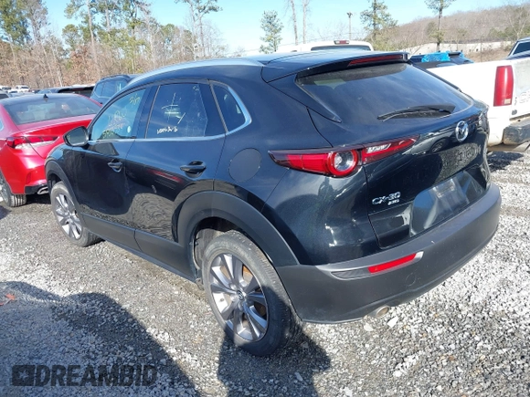 2023 Mazda CX-30 S Premium with VIN 3MVDMBDM7PM528297, listed as a IAAI auction lot 41637542 with 48,935 mi miles and . Bid and sale history available at DreamBid. Image 3.