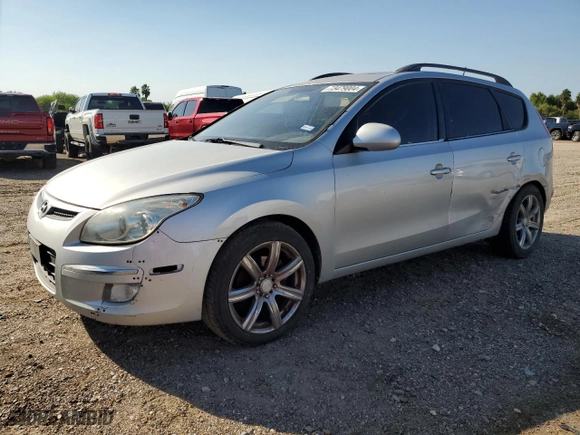 2010 Hyundai Elantra Touring SE with VIN KMHDC8AEXAU072802, listed as a Copart auction lot 73479004 with 129,854 mi miles and Salvage Title. Bid and sale history available at carsss.com. Image 1.