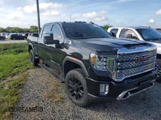 2023 GMC Sierra 3500HD Denali z VIN 1GT49WEY9PF135123, wystawiony jako Copart lot #74175484 z przebiegiem Nie podano mil oraz Nie do naprawy • Non repairable. Historia ofert i sprzedaży dostępna na DreamBid. Obrazek 4.
