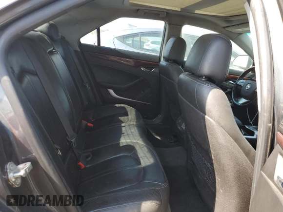 2012 Cadillac CTS Premium z VIN 1G6DS5E35C0128558, wystawiony jako Copart lot #65431155 z przebiegiem 186 593 mil mil oraz Szkoda całkowita • Salvage title. Historia ofert i sprzedaży dostępna na DreamBid. Obrazek 10.