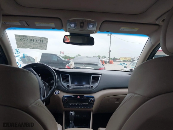 2017 Hyundai Tucson Value with VIN KM8J33A26HU362363, listed as a IAAI auction lot 41940376 with 127,986 mi miles. Bid and sale history available at carsss.com. Image 18.
