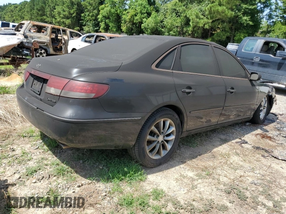 2006 Hyundai Azera SE z VIN KMHFC46F56A035393, wystawiony jako Copart lot #63339195 z przebiegiem Nie podano mil oraz Szkoda całkowita • Salvage title. Historia ofert i sprzedaży dostępna na DreamBid. Obrazek 3.