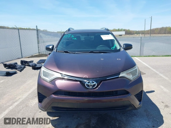 2016 Toyota RAV4 LE with VIN 2T3ZFREV4GW284902, listed as a IAAI auction lot 42054633 with 117,463 mi miles and . Bid and sale history available at carsss.com. Image 13.