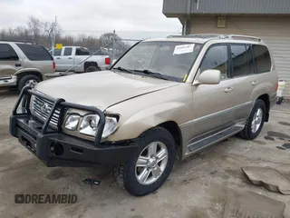 1999 Lexus LX 470 z VIN JT6HT00W8X0045705, wystawiony jako IAAI lot #42005587 z przebiegiem 443 758 mil mil oraz . Historia ofert i sprzedaży dostępna na DreamBid. Obrazek 2.