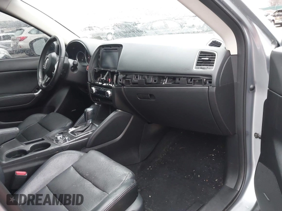 2016 Mazda CX-5 Grand Touring with VIN JM3KE4DY4G0712465, listed as a IAAI auction lot 41859217 with 61,806 mi miles and . Bid and sale history available at carsss.com. Image 5.