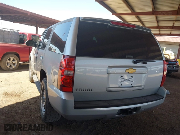 2013 Chevrolet Tahoe LS with VIN 1GNSCAE03DR179027, listed as a IAAI auction lot 42096434 with 205,143 mi miles and . Bid and sale history available at DreamBid. Image 3.