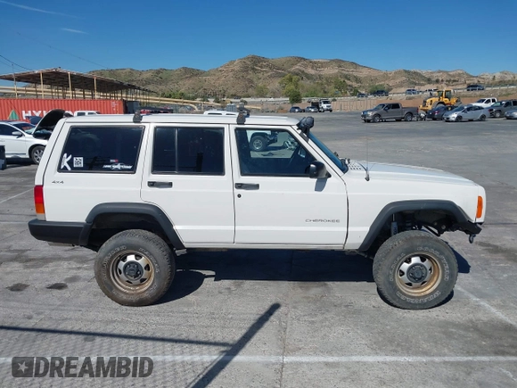 1997 Jeep Cherokee SE with VIN 1J4FJ28S7VL553270, listed as a IAAI auction lot 41825524 with 157,015 mi miles. Bid and sale history available at carsss.com. Image 13.