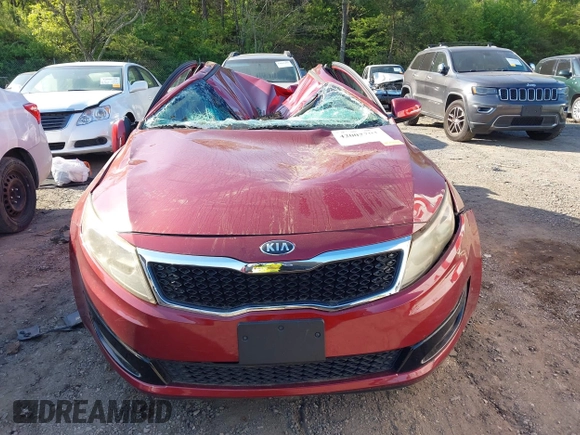 2013 Kia Optima LX z VIN 5XXGM4A76DG152178, wystawiony jako IAAI lot #42002201 z przebiegiem 72 335 mil mil oraz . Historia ofert i sprzedaży dostępna na DreamBid. Obrazek 12.